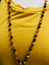 Black & Orange Sparkling Bead Necklace with Fringe and Leopard Hair on Hide Tassel